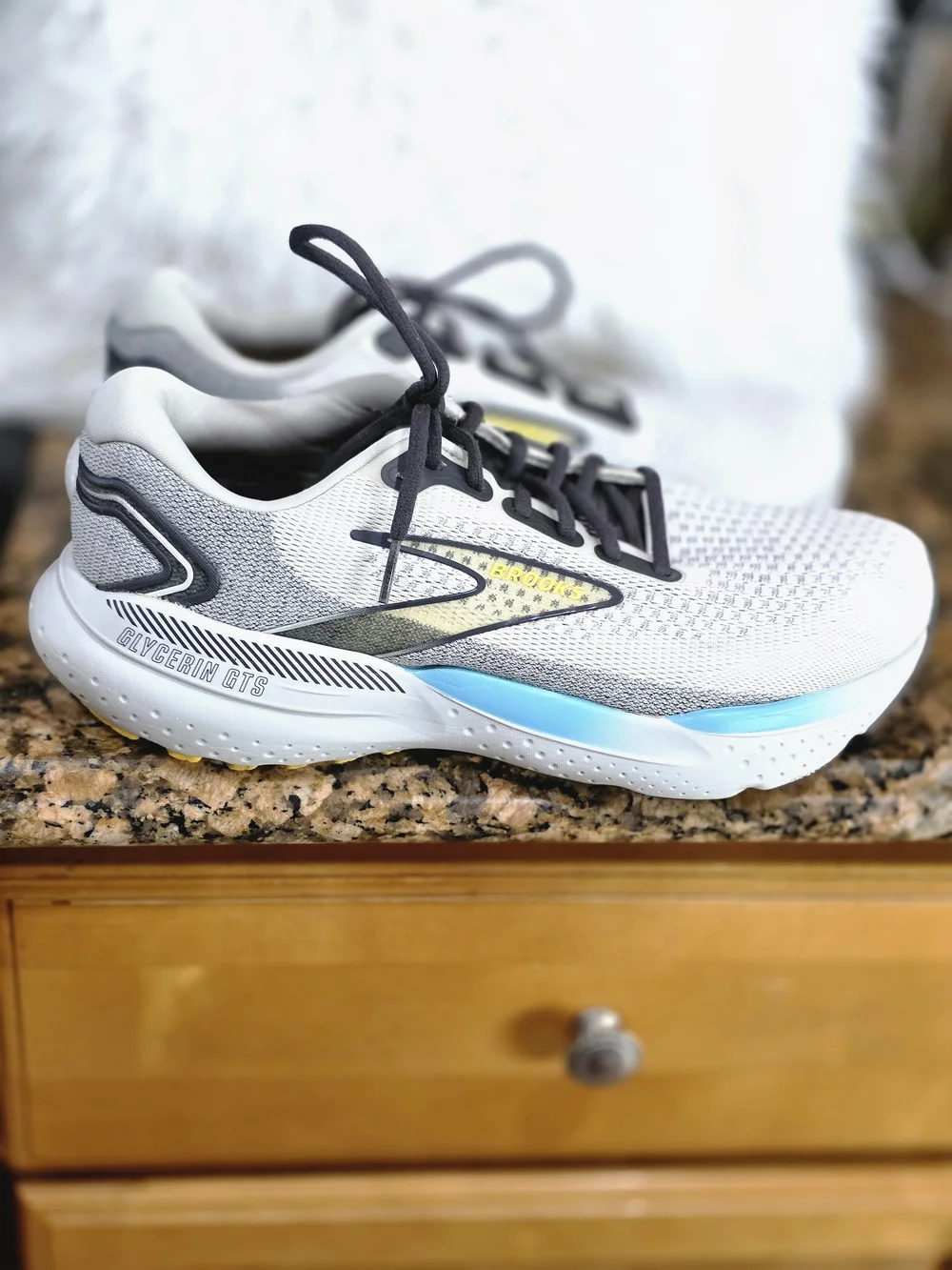 Brooks White & Gray Running Shoes with Blue & Yellow Accents